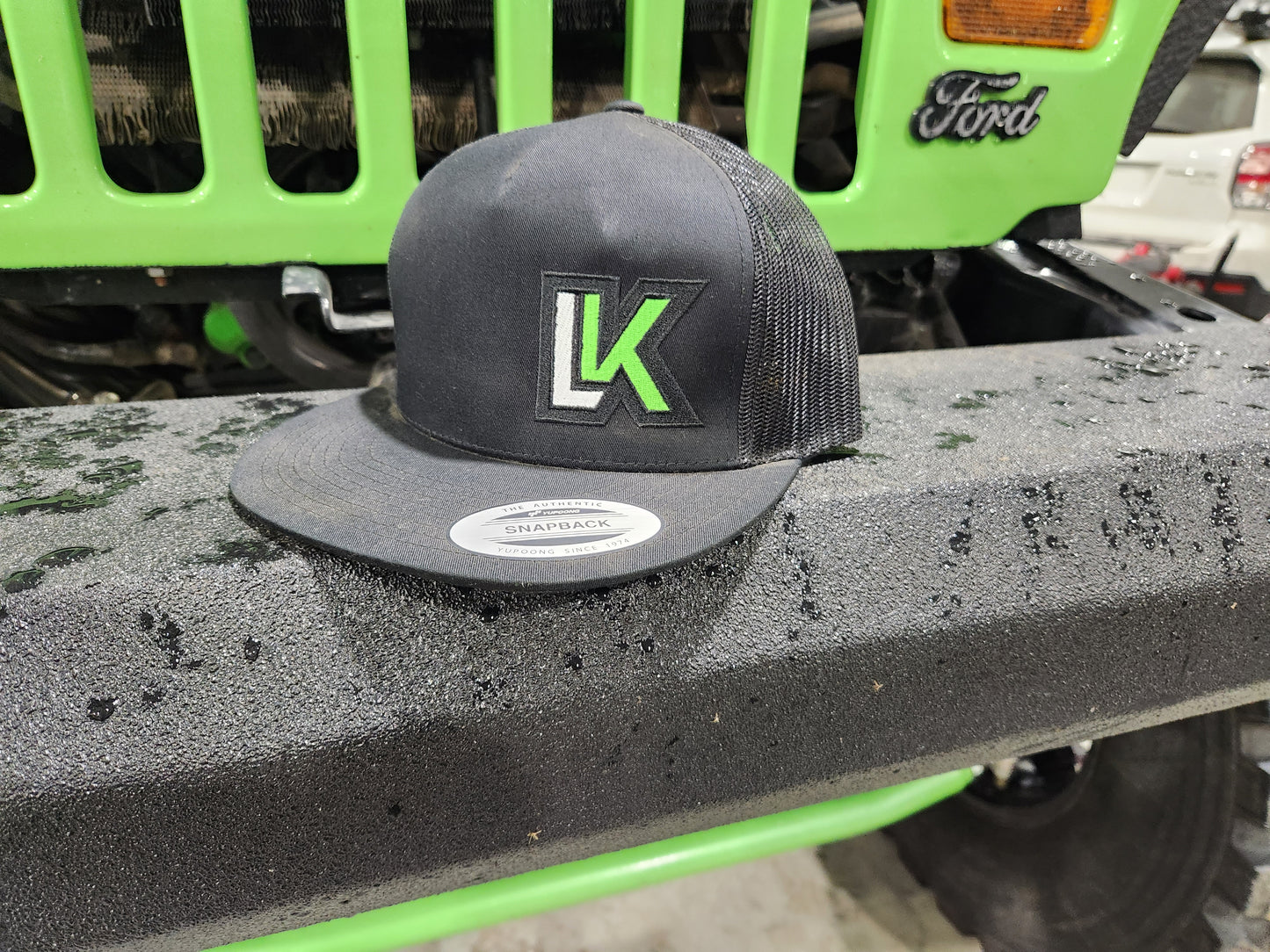 Flat bill stitched logo